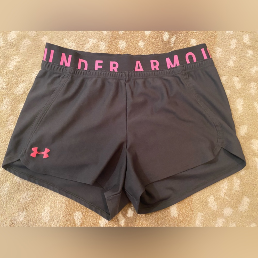 Gray and pink under armour athletic shorts
